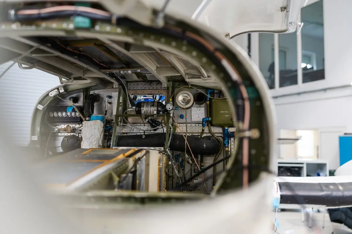 Open nose bay of an aircraft in the hangar