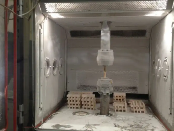 Interior of a climate test chamber with samples on shelves