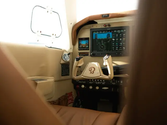Bonanza cockpit with leather interior and custom yokes