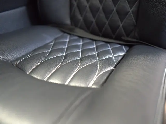 Diamond-stitched black leather seat