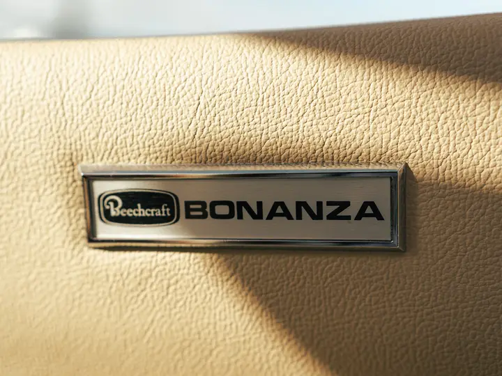 Close-up of an engraved Bonanza nameplate