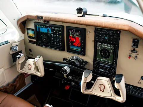 Bonanza cockpit with dual yokes and cream leather trim