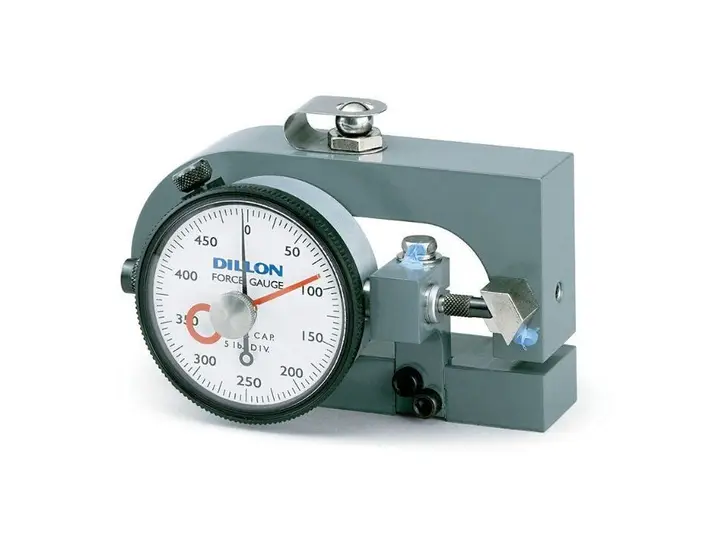 Dial force gauge on a white background