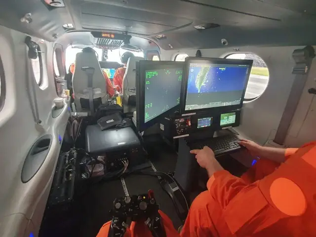 Operator at the AeroIntel workstation in the GOSHAWK cabin