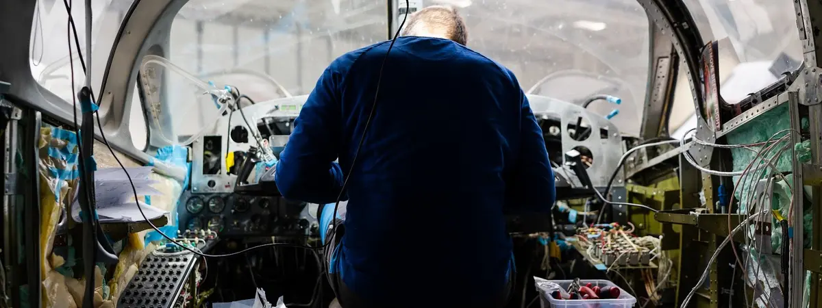 AIR TEAM technician working on a King Air propeller in the Kunovice hangar