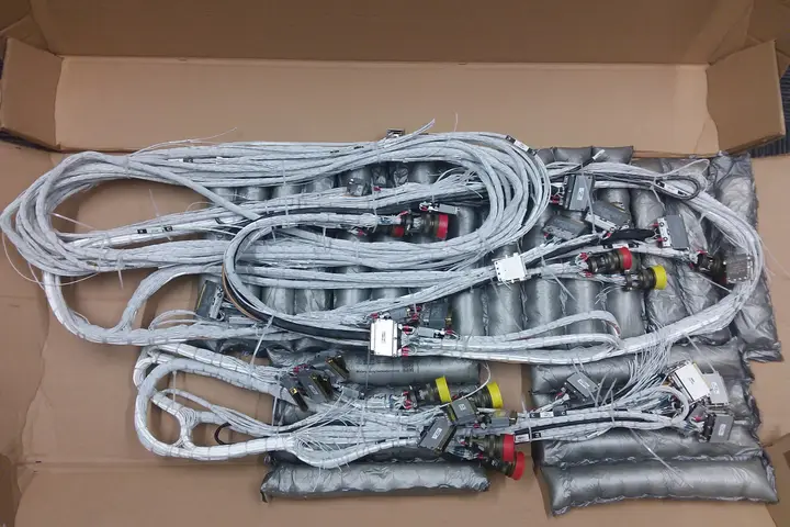Finished harness assemblies packed in a shipping box