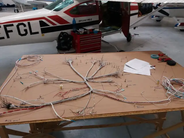 Wiring harness laid out on the harness board
