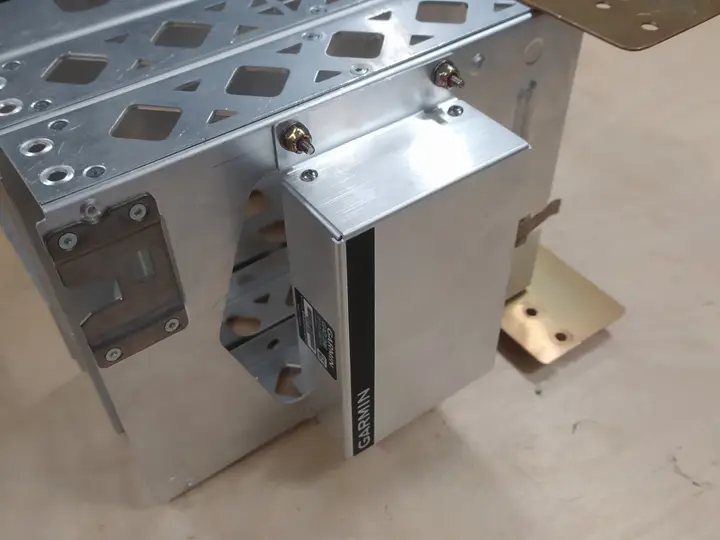 Fabricated aluminium panel mounting bracket with a box assembly attached