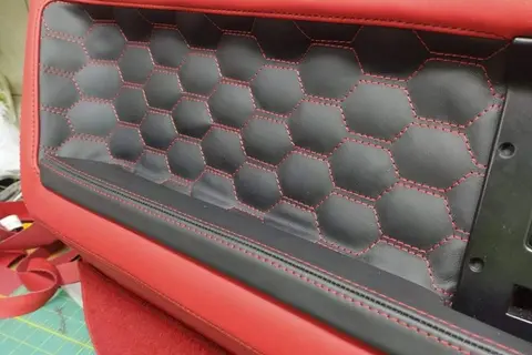 Hex-stitched leather upholstery in red and black