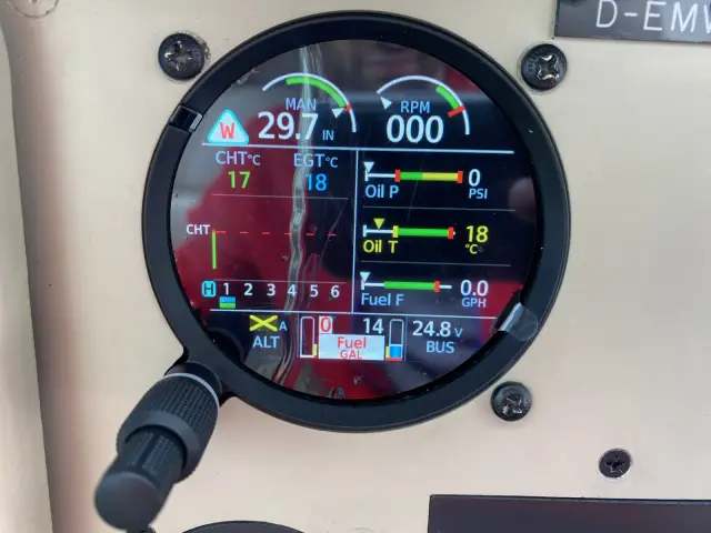 Garmin GI 275 EIS showing manifold pressure, RPM, oil and fuel data
