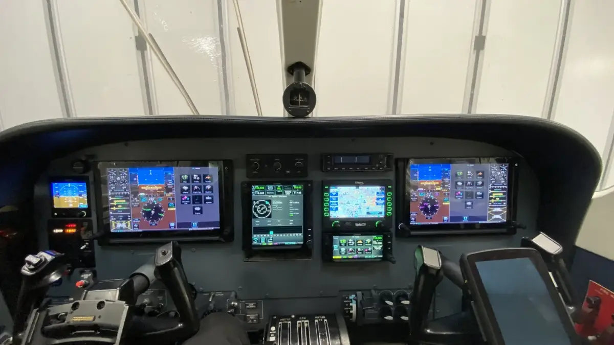 Cessna 340A cockpit with dual Garmin G500 TXi displays and two GTN navigators