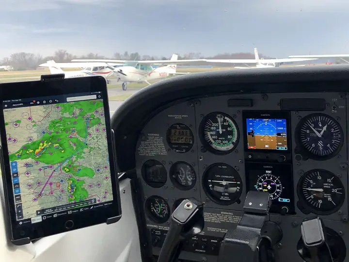 Tablet showing a weather chart mounted in a general aviation cockpit