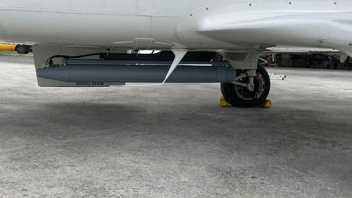 Sensor pod installed under the fuselage of a special-mission aircraft