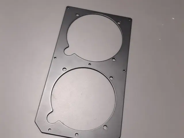 Machined mounting plate with cut-outs for the new instruments