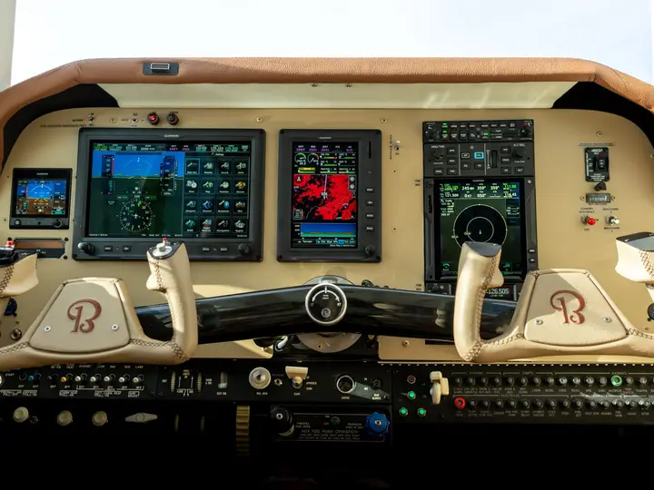 Custom panel with glass displays in a Beechcraft cockpit
