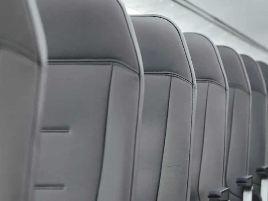 Row of refurbished grey aircraft seats