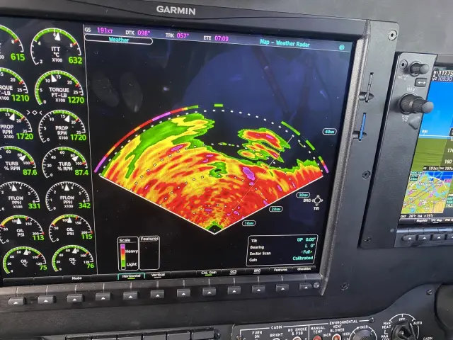 Garmin multi-function display showing weather radar returns